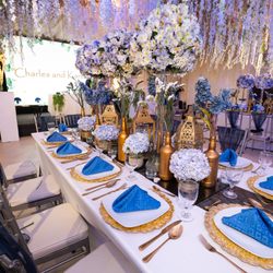 The Pergola Venue for Special Events - Principal sponsors table and stage setup for a wedding