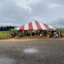 Entrance/Exit tent with picnic tables and plenty of seating inside if you need to take a break
