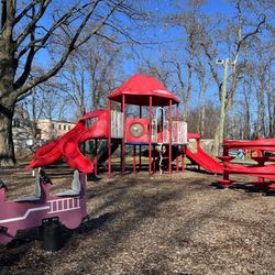 Jenkins Park - There's a bounce to the ground of the playground area even though it's covered with wood chips.