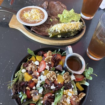 Muy Salsas - a plate of salad and a glass of beer - Mexican Near Me - Los Alamos, New Mexico