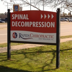 Rapids Chiropractic and Wellness, S.C. - One of our signs at the corner of 8th & Dewey Streets