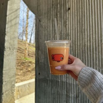 Airship Coffee - Awesome logo on their drinks- this is the orange sunrise smoothie. - Coffee & Tea Near Me - Bentonville, Arkansas Airship Coffee - Awesome logo on their drinks- this is the orange sunrise smoothie. - Coffee & Tea Near Me - Bentonville, Arkansas