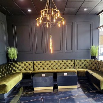 The Spot EaDo - a couch and a table - Lounges Near Me - Houston, Texas