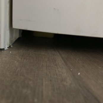Avelar Remodeling - other door that was cut short but we didn't even fuss about this door in hallway. Mainly concerned about bedroom doors and sound. - Flooring Near Me