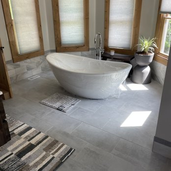Appalachian Tile and Flooring - a bathtub in a bathroom - Tiling Near Me Appalachian Tile and Flooring - a bathtub in a bathroom - Tiling Near Me
