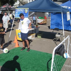 Future BFA athletes test their skills at the BFA Event Booth at the Chivas vs. Real Madrid game at Qualcomm Stadium