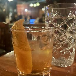 This drink is overwhelmed by a huge brick of ice and a lack of much else