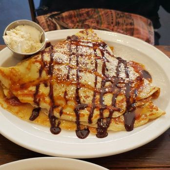 Toast - Close up of the banana nutella crepes - Breakfast & Brunch Near Me - New Orleans, Louisiana Toast - Close up of the banana nutella crepes - Breakfast & Brunch Near Me - New Orleans, Louisiana
