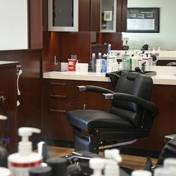 Roosters Men's Grooming Center