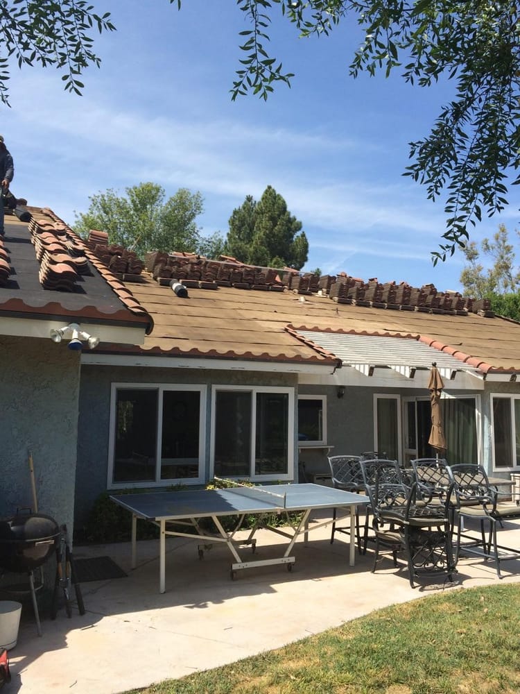 Slide of Wolfe Roofing Company