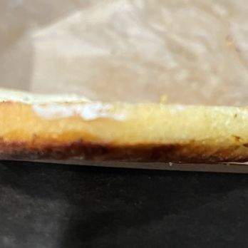 Einstein Bros. Bagels - Bottom half of green chile bagel. Cut unevenly! - Breakfast & Brunch Near Me - West Covina, California
