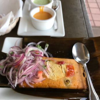 El Rocoto - Chicken Tamale with salsa, the flavors dance in your mouth with the added zing of their great salsas! - Peruvian Near Me - Gardena, California El Rocoto - Chicken Tamale with salsa, the flavors dance in your mouth with the added zing of their great salsas! - Peruvian Near Me - Gardena, California