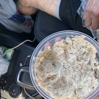 Generation Seafood - a person holding a bowl of food - Seafood Markets Near Me - Big Pine Key, Florida