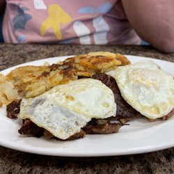 Colonial Restaurant - Extra crispy corn beef hash, two over medium and potatoes browned perfectly.