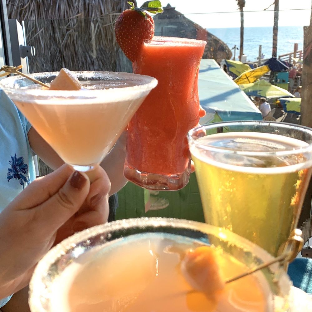 Fins At Sharky's - An assortment of cocktails waiting for sunset - Steakhouses Near Me - Venice, Florida Fins At Sharky's - An assortment of cocktails waiting for sunset - Steakhouses Near Me - Venice, Florida