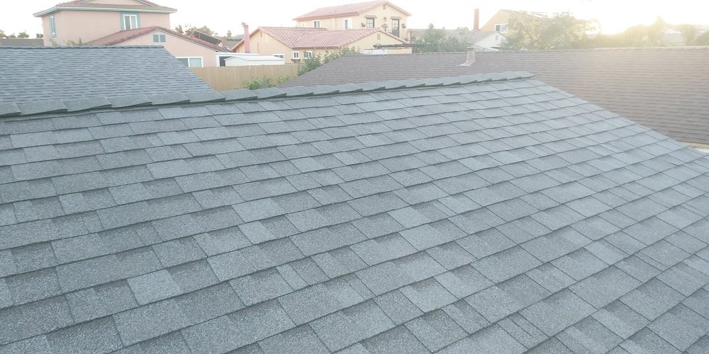 Slide of Dennis Cook Roofing