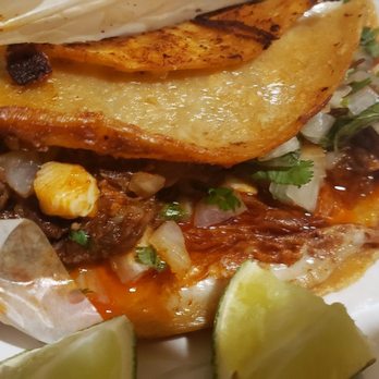 Mangoneada Station - QuesaBirria Tacos - large portions of juicy meat with onion and cilantro. - Tacos Near Me - Las Vegas, Nevada Mangoneada Station - QuesaBirria Tacos - large portions of juicy meat with onion and cilantro. - Tacos Near Me - Las Vegas, Nevada