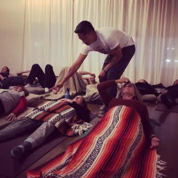 Dharma Yoga House - Palo Santo smudging - Yoga Near Me