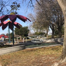 Covered tables, play structure