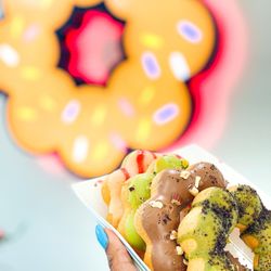 Mochinut - Strawberry banana, pistachio + caramel, milk chocolate + almonds, matcha + Oreos