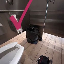 Red Robin Gourmet Burgers and Brews - If they HAVE TO HAVE a trash can there .... It should be placed as shown.