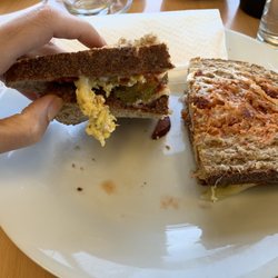 Murat’s Cafe - Turkish Panini Cheese with sucuk (dried spicy beef sausage), egg, tomatoes, pickles, and/or pepper paste Delicious !!!