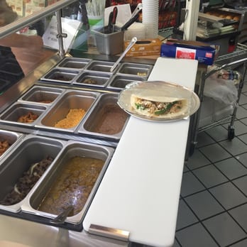 Exxon - a buffet with a variety of food items - Gas Stations Near Me - Decatur, Texas