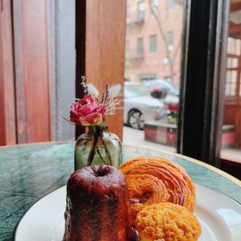 Paquita - a plate of pastries on a table - Tea Rooms Near Me - New York, New York