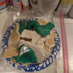 One of 2 paper plates of "broken" ugly cookies