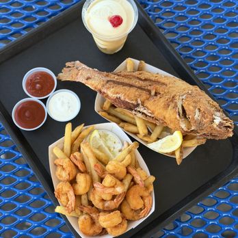 Johnny's Reef Restaurant - Fried Shrimp (~$18), Fried Red Snapper (~$25), Henny Colada (~$16) - Seafood Near Me - Bronx, New York Johnny's Reef Restaurant - Fried Shrimp (~$18), Fried Red Snapper (~$25), Henny Colada (~$16) - Seafood Near Me - Bronx, New York