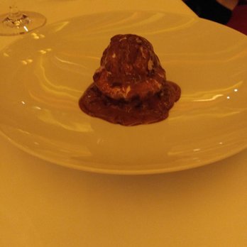 Le Cirque - Chocolate ball.  After they poured the hot chocolate sauce.  Soooooo good!!!! - French Near Me - Las Vegas, Nevada