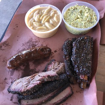 la Barbecue - From top left clockwise: shells & cheese, potato salad, pork ribs, brisket, chipotle sausage - Barbeque Near Me - Austin, Texas la Barbecue - From top left clockwise: shells & cheese, potato salad, pork ribs, brisket, chipotle sausage - Barbeque Near Me - Austin, Texas