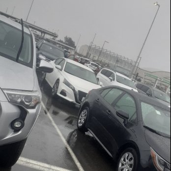 Avis - White Car - Car Rental Near Me - Oakland, California
