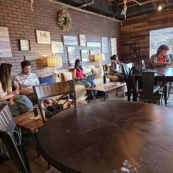 Halwa Bakery & Cafe - The interior of the place full of customers. - Cafes Near Me - Blacksburg, Virginia