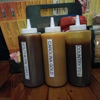 Camp House Bar & Grill - They provide great BBQ sauce at each table - Sports Bars Near Me - Sanford, Florida Camp House Bar & Grill - They provide great BBQ sauce at each table - Sports Bars Near Me - Sanford, Florida