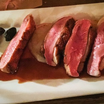 Salty Sow - Duck breast with a cardamom-orange sauce (!!!) on a bed of turnips with oil-cured olives. Heaven. - American Near Me - Austin, Texas