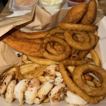 Backfins Crab House - Fried Flounder (1 Piece) x blackened shrimp platter with Onion Rings - Seafood Near Me - Wake Forest, North Carolina Backfins Crab House - Fried Flounder (1 Piece) x blackened shrimp platter with Onion Rings - Seafood Near Me - Wake Forest, North Carolina