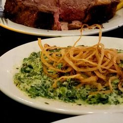 Daniella’s Fresh Seafood and Pasta House - Prime rib king cut with a side of cream spinach and fronions.