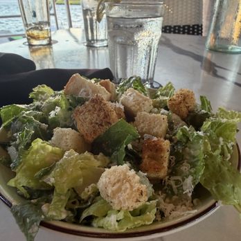 Edgewater 122 - Caesar Salad romaine lettuce + croutons garnished w/ parmesan reggiano | half $7 Croutons were old and hard as a rock. - Salad Near Me - Southport, North Carolina Edgewater 122 - Caesar Salad romaine lettuce + croutons garnished w/ parmesan reggiano | half $7 Croutons were old and hard as a rock. - Salad Near Me - Southport, North Carolina