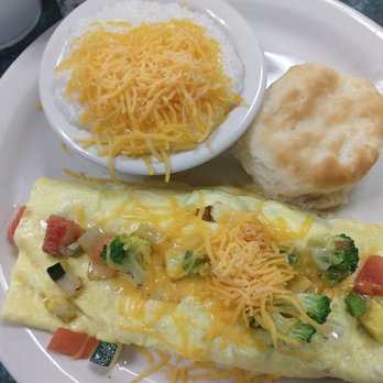 Clary's Cafe - Veggie omelet (veggies inside and out), cheese grits, and biscuit. - Breakfast & Brunch Near Me - Savannah, Georgia Clary's Cafe - Veggie omelet (veggies inside and out), cheese grits, and biscuit. - Breakfast & Brunch Near Me - Savannah, Georgia