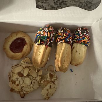 Amaretti Desserts - Thumbprint, almond, raspberry filled chocolate dipped! - Desserts Near Me - Jacksonville, Florida Amaretti Desserts - Thumbprint, almond, raspberry filled chocolate dipped! - Desserts Near Me - Jacksonville, Florida