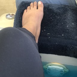 My toe with blood from where she cut me.