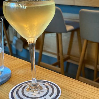 MĀZE - A sake-based version of a French 75. - New American Near Me - Honolulu, Hawaii MĀZE - A sake-based version of a French 75. - New American Near Me - Honolulu, Hawaii