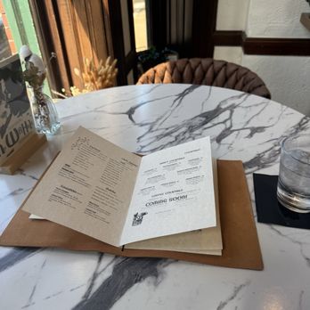 Mama Koko's - Great window table in corner - Coffee & Tea Near Me - Baltimore, Maryland Mama Koko's - Great window table in corner - Coffee & Tea Near Me - Baltimore, Maryland
