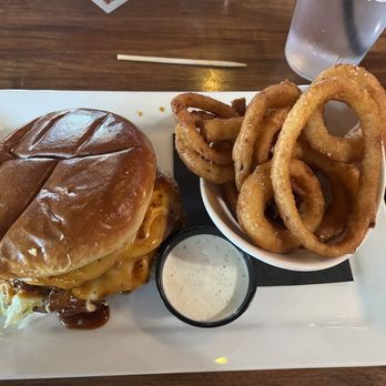 The Porch - Grilled Lanai chicken sandwich. The bun was soft and delicious. Onion rings were perfect! - Sports Bars Near Me - Phoenix, Arizona The Porch - Grilled Lanai chicken sandwich. The bun was soft and delicious. Onion rings were perfect! - Sports Bars Near Me - Phoenix, Arizona