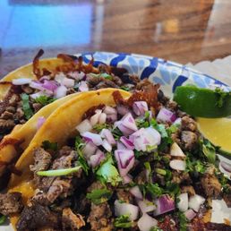 Quesa style asada tacos