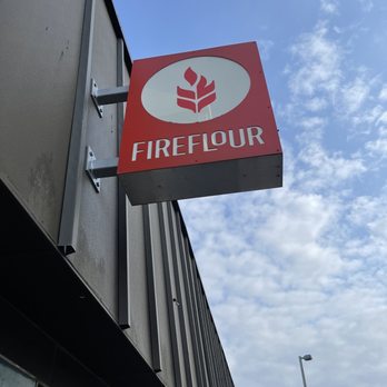 Fireflour Pizza + Coffee Bar - a red and white sign - Pizza Near Me - Bismarck, North Dakota Fireflour Pizza + Coffee Bar - a red and white sign - Pizza Near Me - Bismarck, North Dakota