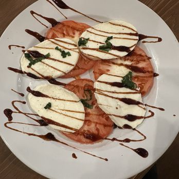 Black Iron Grille - Caprese salad - Steakhouses Near Me - Kent, Ohio Black Iron Grille - Caprese salad - Steakhouses Near Me - Kent, Ohio