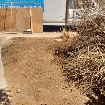Nelson Plumbing - The final product - compacted soil next to the sidewalk and new cleanout - Plumbing Near Me