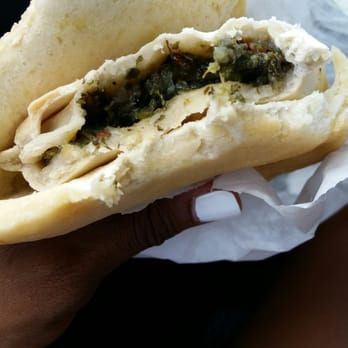 Foxx Original Jamaican Restaurant - Callaloo patty with coco bread. Surely made in house. Marvelously fresh. - Caribbean Near Me - Atlanta, Georgia Foxx Original Jamaican Restaurant - Callaloo patty with coco bread. Surely made in house. Marvelously fresh. - Caribbean Near Me - Atlanta, Georgia